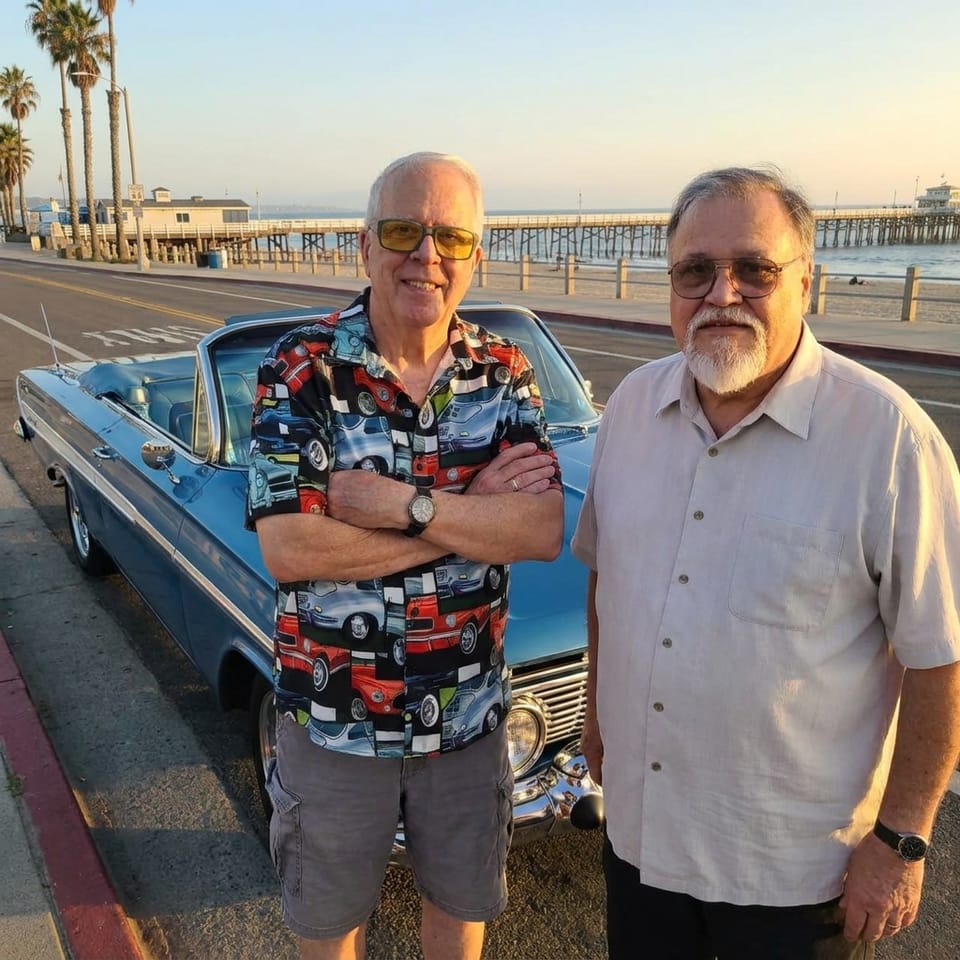 Harvey and Michael Camire Chase Route 66 Horizons in a Blue 1961 Chevrolet Impala Convertible
